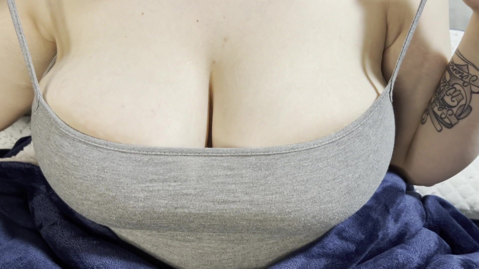 My G cups in a grey cami